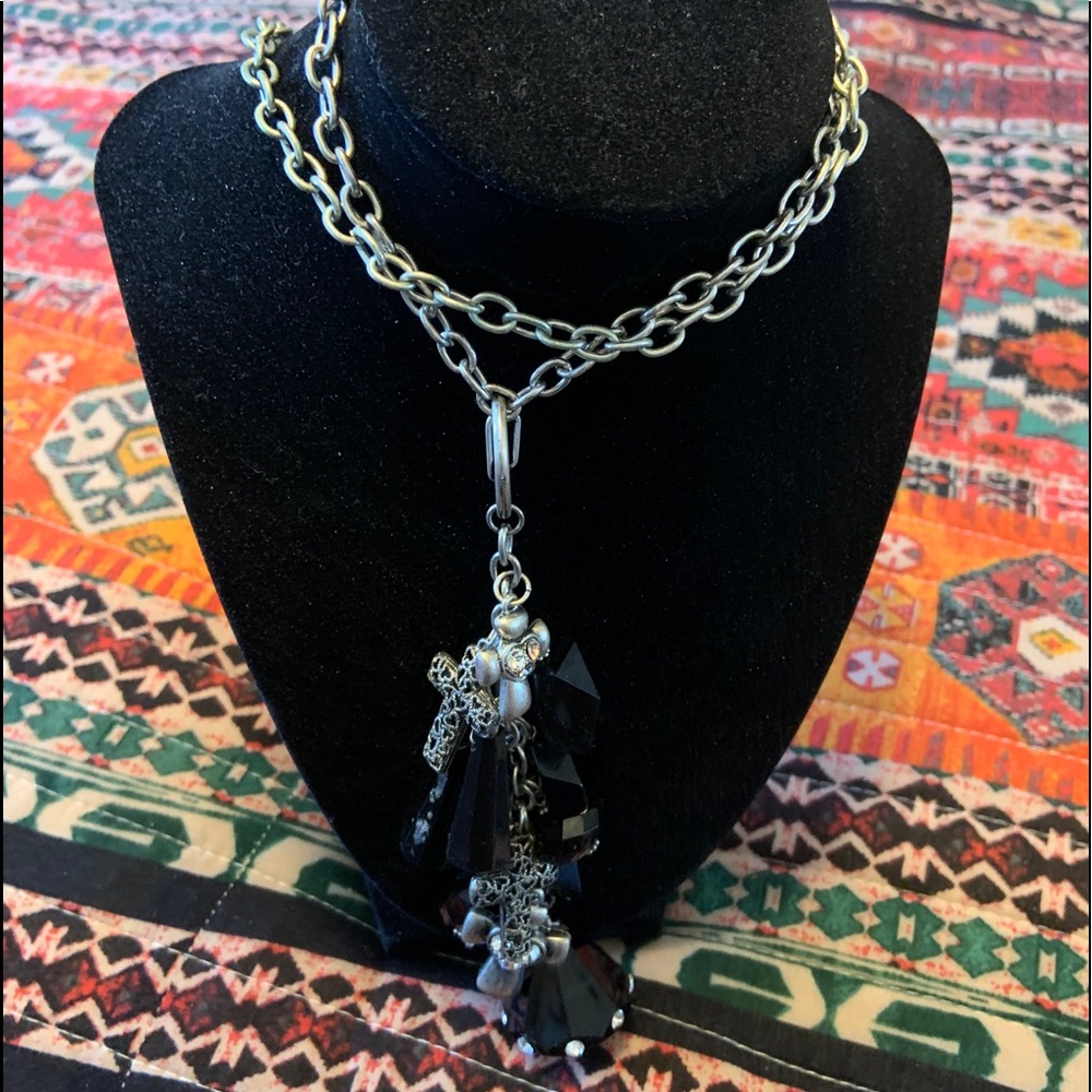 Unique charm necklace with crosses.
